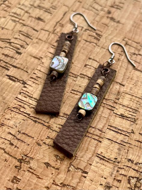 "Upcycled leather dangle earring cut from scraps paired with coconut shell and abalone.  Earrings are 2\" long, 3/8\" wide.  Hook is stainless steel." Resin Leather Jewelry, Post Earrings Handmade, Homemade Leather Earrings, Leather Beaded Earrings, Burlap Earrings, Upcycle Jewelry Ideas, Leather Scraps Ideas, Leather And Bead Earrings, Leather Earrings Ideas