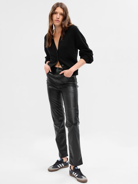 Fit: Hugs your hips, holds you in & ends with a straight leg that hits at the ankle.  Fabric: 100% Polyester.  Stretch: No-Stretch Pants.  Rise: High Rise Pants.  Look: A five-pocket vegan leather pant.  Details: Zip fly & five-pocket styling.  Our High Rise Pant has an 11" 28 cm) rise. ​ Fitted through the hip & thigh.  Straight leg.  Ankle-length pants.  14. 5" 37 cm) leg opening.  Inseam: Petite 25. 5"/65 cm, Short 26"/66 cm, Regular 27. 5"/70 cm, Long 29. 5"/75 cm, Tall 32"/81 cm.  Models we Black Turtleneck Outfit, Vegan Leather Pant, Turtleneck Outfits, Leather Pants Outfit, Pant Trends, Black Leather Pants, Leather Pant, Black Turtleneck, High Rise Pants