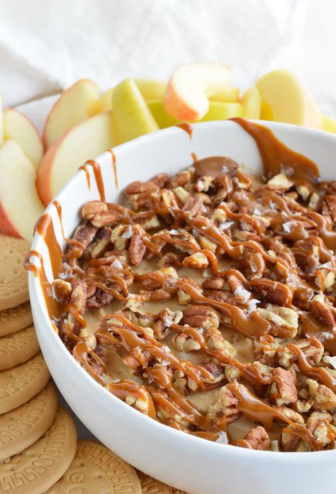 If you need a last minute dessert recipe that is sure to be a hit this Salted Caramel Pecan Cheesecake Dip is it! Caramel marshmallow fluff cream cheese filling is topped with pecans, caramel and flaked salt. This dessert dip is so tasty and only takes 5 minutes to make! Great for potlucks, game day or holiday dessert! #nobakedessert #dessertdiprecipes #dessertrecipes #easydessert #cheesecakedip Pecan Cheesecake Dip, Wonky Wonderful, Carmel Cheesecake, Caramel Cheesecake Dip, Caramel Pecan Cheesecake, Dessert Dip Recipes, Cream Cheese Recipes Dip, Cake Dip, Dessert Dip