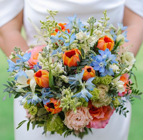 The classic elegance of a monochromatic bouquet is always lovely but the extra pop of color in floral arrangements this year has been a pleasant surprise! . . . . . . . . . #weddinginspiration #weddingflorals #weddingbouquet #weddingphotographer #summerweddings #colorfulbouquet #newyorkphotographer #eastcoastphotographer #2025bride Orange And Blue Floral Arrangements, Orange And Blue Bouquet, Monochromatic Bouquet, Orange And Blue Wedding, Montana Summer, Grand Estate, Orange Wedding Flowers, Harvest Party, Wedding Colors Blue