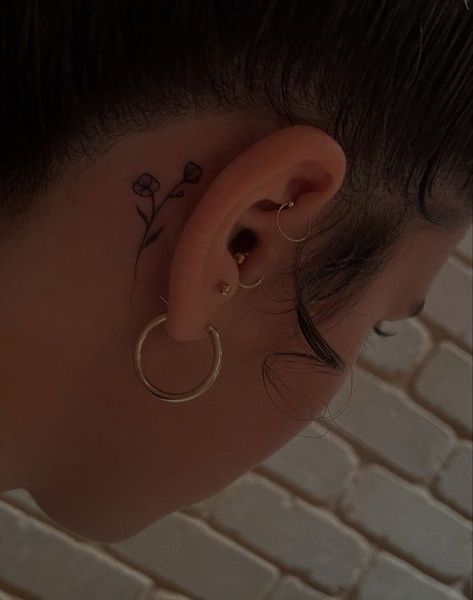 Behind Ear Tats Flower, Poppy Behind Ear Tattoo, Sparrow Tattoo Behind Ear, Behind The Ear Lily Tattoo, Sun Tattoo Behind Ear, Invincible Tattoo, Back Of The Ear Tattoos, Behind The Ear Tattoo Ideas Small, Flower Behind Ear Tattoo