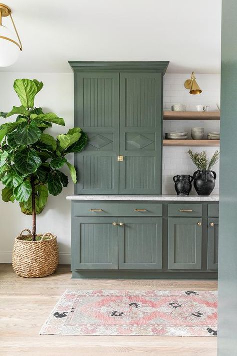 Green Beadboard, Beadboard Cabinets, White Cottage Kitchens, Brown Shelves, Modern Farmhouse Paint Colors, Green Kitchen Island, Pewter Green, Rustic Wood Floors, Green Laundry