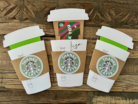 Coffee Cup Gift Card Holders, made by hand using 250gsm white, pearlescent white, and kraft cardstock.  The green circle, coffee cup lid, and back label are made with sparkly pearlescent cardstock.  Personalized to add the recipient's name on the front.  There is an area to write a message on the back of the sleeve. Starbucks Gift Card Holder, Funny Wine Labels, Holiday Gift Card Holders, Paw Print Ornament, Wedding Wine Bottles, Coffee Gifts Card, Thanks A Latte, Holiday Gift Card, Gift Card Holders