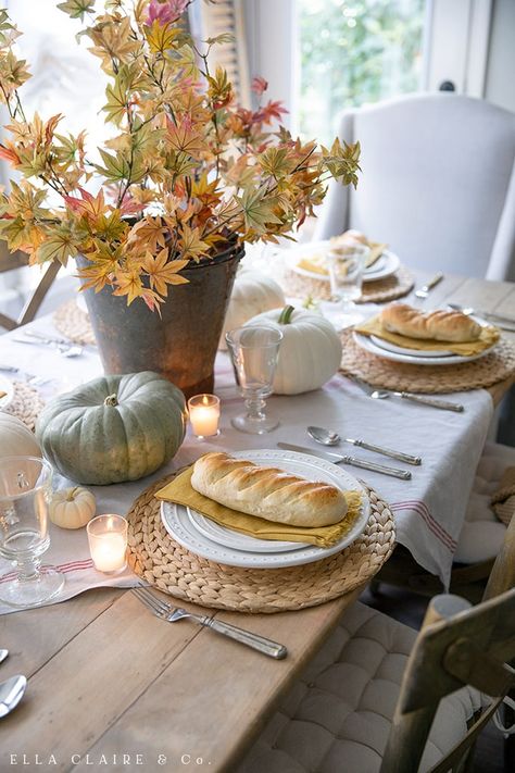 How to put together this golden yellow fall tablescape with autumn leaves and heirloom pumpkins, candlelight, and cozy touches perfect for entertaining family and friends for Thanksgiving or a special dinner. Heirloom Pumpkins, Cozy Candlelight, Vibeke Design, Fall Table Settings, Fall Thanksgiving Decor, Fall Tablescapes, Autumn Decorating, Elegant Fall, Special Dinner