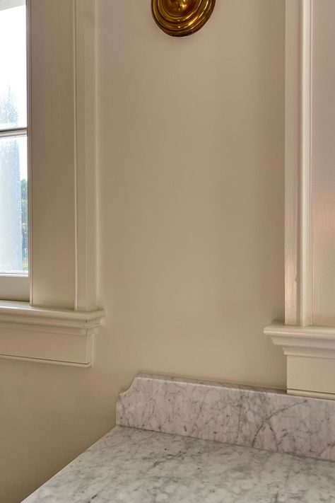 Classic Carrara Marble Counters in a Traditional Kitchen - The Makerista Carrara Kitchen, London Grey Caesarstone, Carrara Marble Backsplash, Traditional Backsplash, Carrara Marble Kitchen, Ivory Cabinets, Marble Kitchen Counters, Caesarstone Kitchen, Carrara Marble Bathroom