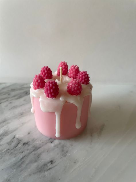 Cute mini raspberry cake candle that's made from pure soy and coconut wax. This candle smells like a berry cake, good enough to eat(please don't) and is raspberry and vanilla scented. This candle is so cute and can be used as decor or is great for a small birthday gift or Mother's Day present. This is a high-quality candle. Soy and coconut wax is also a favorite of environmentally conscious consumers. They even burn slower and more refreshing (helping to better distribute fragrance); moreover, they are non-toxic and less likely to trigger allergies. candle is about 4.5oz in weight The candle is paraffin free, please be careful ordering if you live in a hot area and please bring indoors immediately when the candle arrives. Candle appearance will vary slightly as this is a handmade product. Candle Cake Ideas, Cake Candles Diy, Desert Candles, Candle Dessert, Candle Photography Ideas, Lux Candles, Raspberry Torte, Dessert Candle, Cute Candle