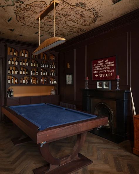 INDULGENTLY rich brown, to be precise #copperbeech by @paintandpaperlibrary colour palette stands out in this house. Looking for the focal point there? This room has many... A custom pool table doubles as a dining table @billiards.uk, making it perfect for entertaining guests. The impressive whiskey collection of the clients, which is proudly displayed in a custom-built cabinet @ogilviesofhaddington and lit from within, steals the show. The room's ceiling is a work of art featuring a stunni... Billiards Room Decor Vintage, Custom Pool Table, Billiards Room Decor, Whiskey Collection, Custom Pool Tables, Copper Beech, Mid Century Modern Interior Design, Custom Pool, Mid Century Modern Interiors