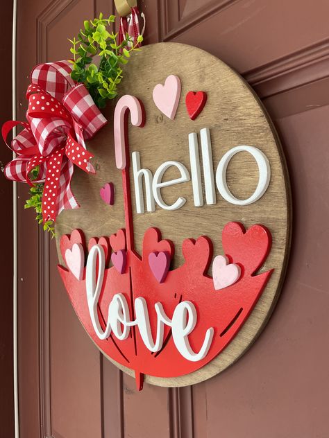 Get into the season of love with this beautiful 3d raised lettering Valentine's Front Door Hanger! We now cut all our signs with birch plywood which is a much harder and better quality than pine. Laser Cut Valentines Ideas, Valentine Diy Crafts To Sell, Valentine Laser Ideas, Valentines Door Hanger Diy, Valentines Signs Wooden, Valentine’s Day Door Hangers, Valentines Laser Ideas, Valentines Day Laser Cut Ideas, Valentines Door Hangers