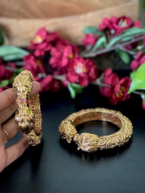 A pair of Designer Antique Gold Lion head Kada /bracelets/ Wedding bangles /Temple Jewelry / Nagas bracelet/ bangle in size 2.4 & 2.6” Lion Head Bracelet, Butter Paper, Bracelets Wedding, Wedding Bangles, Gold Lion, Temple Jewelry, Antique Gold Jewelry, Bangles Bracelets, Diamond Bangle