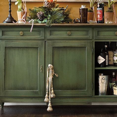 There are a few different techniques you can use to give your painted furniture piece an antique look. Here are 3 of the most common ways: Antique Kitchen Cabinets, Green Painted Furniture, Distressed Furniture Diy, Painted Furniture Colors, Green Furniture, Antique Cabinets, Distressed Furniture, Painting Furniture Diy, Lounge Decor