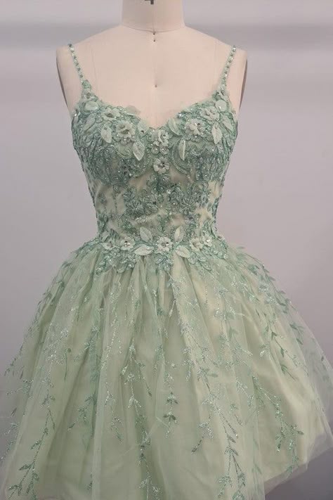 Conformation Dresses Blue, Green Short Corset Dress, Sage Green Dama Dresses Short, Sage Green Damas Dresses For Quince, Light Green Homecoming Dresses Short, Green Quinceanera Dama Dresses, Enchanted Forest Theme Homecoming Dress, Enchanted Forest Dama Dresses, Enchanted Garden Homecoming Dress