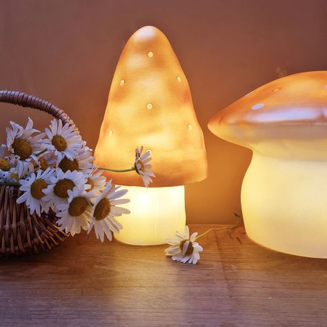 This night light Medium Mushroom Gold opens a world of soft dreams. It will help the little ones to fall a sleep and alight or not, it is a nice decorative object. When illuminated, it will spread a soft and veiled light. Traditonally made and handpainted in Germany. #nightlights #lights #heico #mushroom #lampechamignon #madeingermany #egmonttoys #vintage #decoration #gold Mushroom Nursery, Small Mushroom, Egmont Toys, Baby Room Themes, Nursery Night Light, Whimsical Home, Dream Land, Kids Night, Night Light Kids