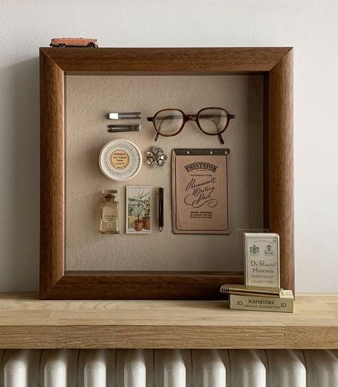 Memento Display Ideas, Memrobilia Display Ideas, Framed Objects Wall Art, Gallery Wall With Shadow Boxes, Shadow Frames Ideas, Pin Shadow Box Display, Sentimental Gallery Wall, Bathroom Shadow Box Ideas, Memory Box Frame Ideas