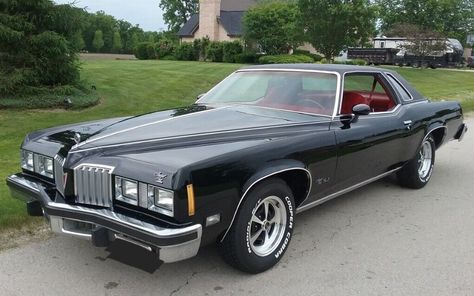 This 1977 Pontiac Grand Prix SJ has only 65k miles and a beautiful new black paint job! Could you see yourself cruising around town in this one? #GrandPrix, #Pontiac, #SJ Pontiac Emblem, West Coast Cars, Pontiac Grand Prix Gtp, Window Molding, Grand Prix Cars, Pontiac Lemans, Pontiac Cars, Pontiac Grand Am, American Classic Cars