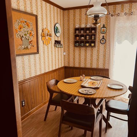 I’ve realized one of the things I’m missing to bring home the 70s style is a lot of plants. 🪴 Home decor | vintage vibes | groovy | hippie | flower power | seventies | thrifted home | wood paneling | mushrooms | crewel | embroidery | dining room | kitchen | yellow | mustard | wallpaper 70s Wainscoting, Groovy Dining Room, Vintage Wood Paneling, 70s Dining Room, 1970s Dining Room, 70's Aesthetic, Dining Room Artwork, Theme House, Kitchen Yellow