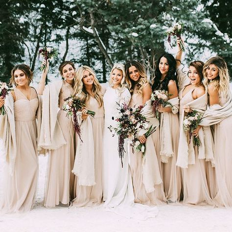 Brides.com: . Dancing with the Stars' Lindsay Arnold, Emma Slater, Jenna Johnson, and Brittany Cherry. Just imagine the dance floor at this reception! DWTS pro, Witney Carson, called upon her twirling co-stars to serve as bridesmaids at her New Year's Day wedding. Lindsay Arnold, Emma Slater, Jenna Johnson, and Brittany Cherry all donned matching pale pink Amsale gowns and wintery wraps for the occasion. Wedding Color Schemes Winter, Winter Wedding Bridesmaids, Winter Wedding Color Palette, Winter Bridesmaids, Winter Bridesmaid Dresses, Winter Wedding Photos, Champagne Bridesmaid, Champagne Bridesmaid Dresses, Winter Wedding Colors