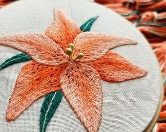 Embroidery paintings | Etsy Realistic Embroidery, Lily Embroidery, Embroidery Instructions, Needle Painting, Orange Lily, Lily Design, Long And Short Stitch, Diy Embroidery Patterns, Brazilian Embroidery