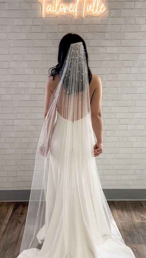 This stunning pearl veil features different sized faux pearls cascading from the crown of the veil down. The pearls are individually hand placed on this veil for a beautiful handmade heirloom piece. The pearls are concentrated at the top of the veil and stop near fingertip length(however adjusted for length, more pearls stop higher for a fingertip length and lower for a cathedral length). The bottom of the veil is plain. This veil would be fabulous paired with a modern crepe minimalist gown. Eac Modern Veil, Floor Length Veil, Minimalist Gown, Beaded Veils, Layered Veil, Pearl Veil, Bridal Hair Inspiration, Wedding Veil Accessories, Long Veil