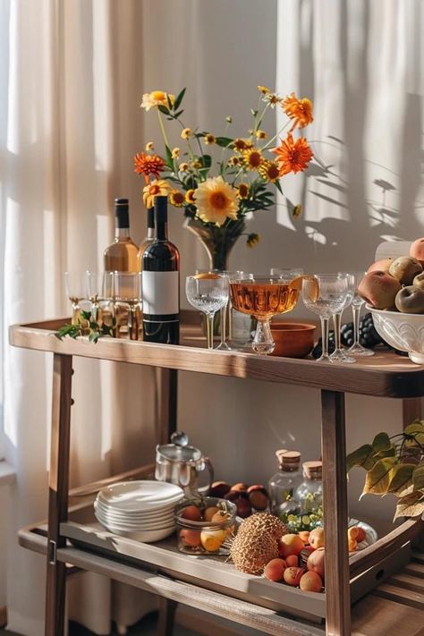 Entertain in Style with Thanksgiving Theme Bar Carts Thanksgiving Bar Setup, Wooden Bar Cart Styling, Fall Bar Cart Decor, Bar Cart In Kitchen, Vintage Bar Cart Styling, Thanksgiving Bar Cart, Fall Bar Cart, Bar Cart Inspo, Thanksgiving Dinner Table Setting