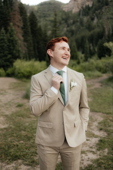 Groom With Tan Suit, Sage And Tan Groomsmen, Tan Suit With Green Bow Tie, Beige Suit With Sage Green Tie, Tan Suit With Sage Green Tie, Tan Suit With Green Tie, Tan Suit Groom, Tan Groomsmen Suits, Tan Groomsmen