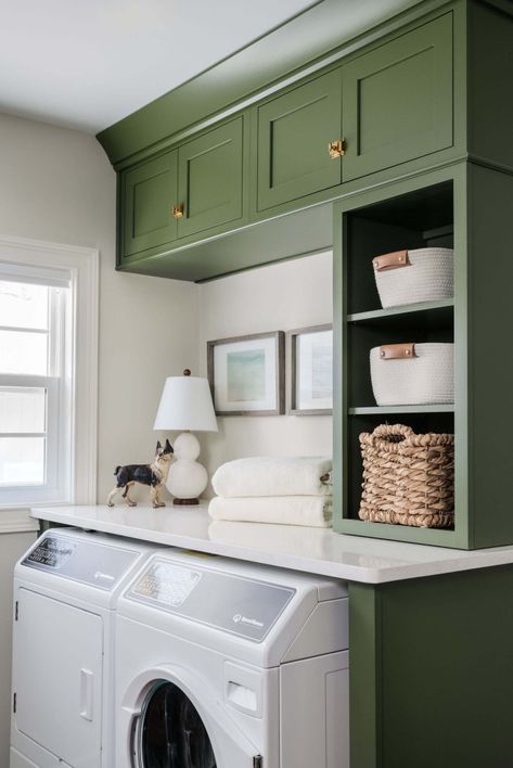 Allie Reed Design at Woodsman Kitchens and Floors - Inset cabinets with unlaquered brass hardware - open shelving in laundry room green cabinets - Speed Queen washer/dryer Speed Queen Laundry Room, Laundry Room Green Cabinets, Shelving In Laundry Room, Laundry Room Green, Laundry Room Curtains, Speed Queen Washer, Unlaquered Brass, Cape Cottage, Waterfall House