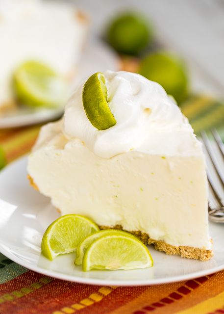 Frozen Key Lime Box Pie - only 4 ingredients! A store-bought graham cracker crust filled with a no churn key lime ice cream made with key limes, heavy cream and sweetened condensed milk. Only takes a minute to make and it tastes amazing! Fantastic key lime flavor! I made this for a party and it was gone in a flash! Everyone asked for the recipe!! Key Lime Ice Cream, Key Lime Pie Ice Cream, Frozen Key Lime Pie, Key Lime Recipes, Key Lime Desserts, Lime Ice Cream, Ice Cream Pie Recipe, Key Limes, Spring Recipes Dessert