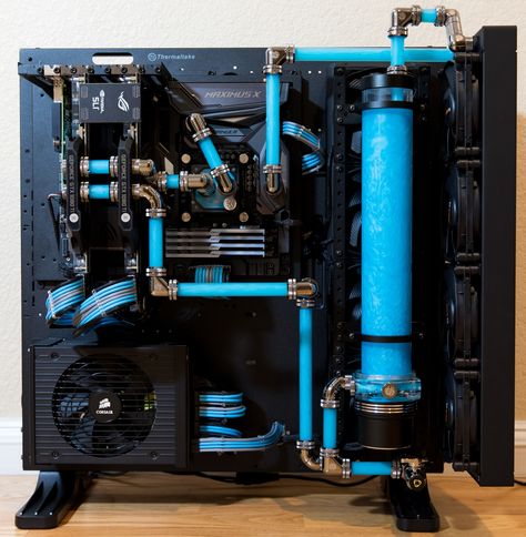 Thermaltake P5 custom water cooled build.  See https://photos.google.com/share/AF1QipP-U3sg9LtCkHHTPHNF4zSCsf8cZbRM2_-fQNt9fDtzkzFMvnjIxiRjLYNFzjfksA?key=NW1DSjlSdUdPbE9BNTMtdktFUWo2M1BWWXJOWENR Pc Builds, Cooler Master, Mini Itx, Custom Paint Jobs, Pc Case, Open Frame, Water Cooling, Pc Cases, Water Cooler