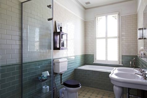 In a newly remodeled and refurbished Edwardian villa in London, dark accents link past and present and introduce a moody vibe. Edwardian Bathroom, Chiswick London, Ikea Vanity, Dark Green Kitchen, London Houses, White Bathroom Tiles, Picture Rail, Victorian Bathroom, Mosaic House