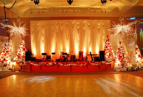 Christmas stage ~ #party #decor #christmas #trees #lights Christmas Stage Decorations, Snow Covered Christmas Trees, Christmas Stage Design, Christmas Classroom Treats, White Christmas Party, Christmas Party Backdrop, Simple Stage Decorations, Christmas Tree And Fireplace, Christmas Party Photo