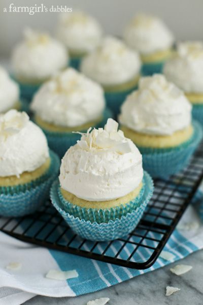 Coconut Cupcakes with Fluffy Coconut Buttercream from afarmgirlsdabbles.com Coconut Buttercream Frosting, Coconut Cupcake Recipes, Coconut Cupcake, Frost Cupcakes, Coconut Buttercream, Coconut Cupcakes, Buttercream Recipe, Cupcake Recipe, Just Wait