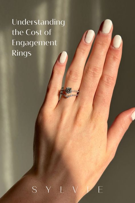 Thinking about purchasing an engagement ring? It's not just a romantic gesture—it's also a big financial decision. Whether after a traditional and timeless piece, a unique modern design, or a classy vintage vibe, we’ve got you covered. From the diamond quality and carat weight to the metal and design, here’s everything you need to know before buying your future bride's dream ring. Understanding The Cost Of Engagement Rings | Engagement Ring Shopping | Sylvie Jewelry Non Traditional Engagement Rings Vintage, Sylvie Engagement Rings, Engagement Ring Shopping, Traditional Engagement Rings, Classy Vintage, Romantic Gestures, Future Bride, Rings Engagement, Engagement Ring Styles