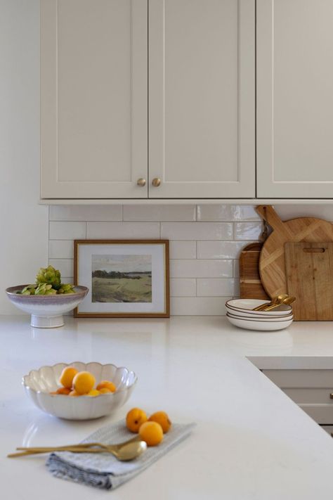 neutral kitchen details Kitchen Cabinet Colors With White Subway Tile, Best White Subway Tile Kitchen, Tan Cabinet Kitchen, Calcutta Quartz Counter Tops Backsplash, Long White Subway Tile Kitchen, French Farmhouse Kitchen Backsplash, Ivory Quartz Countertop, 2x12 Subway Tile Backsplash, Horizontal Backsplash Kitchen