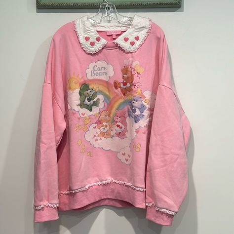 New Without Tags Brand Collab Dolls Kill X Care Bears Women’s Plus Size Xxl Pullover-Sweatshirt Oversized Sweatshirt Soft Jersey Construction Fleece Lining Care Bears In The Clouds Graphic Rainbow And Star Graphics At Front, A Lace-Trimmed Collar With Embroidered Hearts, And Long Sleeves. 60% Cotton 40% Polyester Machine Washable Pit To Pit 31” Bb6/Oi Carebears Clothes, Nostalgia Cartoons, Thrift Outfits, Clouds Graphic, Brand Collab, Pastel Clothes, American Sweater, Sweater Care, Embroidered Hearts