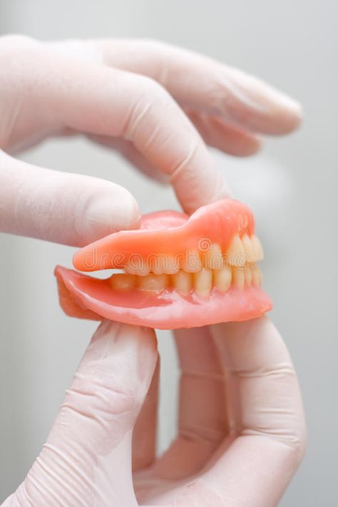 Artificial teeth. A doctor holding in her hand artificial teeth #Sponsored , #sponsored, #Sponsored, #teeth, #artificial, #hand, #Artificial Doctor Background, Artificial Teeth, Artificial Hand, A Doctor, Free Stock Photos, Royalty Free Stock Photos, Stock Images, Stock Photos, Ethnic Recipes