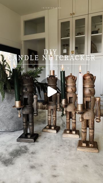 LIZ +  AMY on Instagram: "Diy the cutest nutcracker candles 🤍 when I saw these online and didn’t get them in time I knew I had to make them! Aren’t they so fun?! These would also make a great gift for a host or anyone really. I also made one that sits on the top of its head.  All I did was cut off the knob and glue it.  The most important part is gluing on the candlestick holder. Be sure it’s far enough forward, that way it sits away from the nutcrackers head, so when you light it the flame is not near the wood. Also, be sure it’s level with the little candlestick holder below. So easy guys! I’ll share all the details, step by step and supplies I used in stories. I’ll also save it to my highlights 🤍 #diychristmas #nutcracker" Nutcracker Inspired Christmas Decor, Nutcracker Themed Christmas Decor Diy, Christmas Nutcracker Theme, Diy Painted Nutcracker Ideas, Painting Nutcrackers, Nutcracker Themed Christmas Decor, Nutcracker Themed Christmas, Yuletide Blessings, Wood Nutcracker