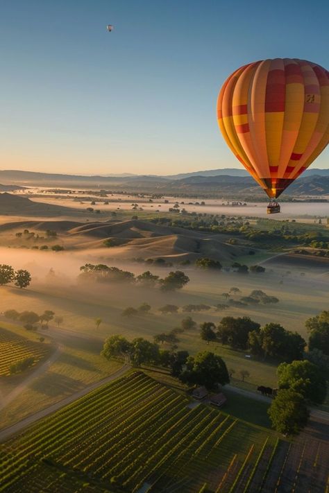 Float Above Stunning Landscapes with Hot Air Balloon Rides 🎈✨ Take to the skies with a hot air balloon ride. Enjoy panoramic views of beautiful landscapes, from rolling hills to serene valleys, and experience the tranquility of floating above it all. 🌿🌄 #HotAirBalloon #AdventureTravel #SkyHighAdventures Hot Air Balloon Ride, Fall Fest, Stunning Landscapes, Hot Air Balloon Rides, Air Balloon Rides, Inspo Pics, Above The Clouds, Rolling Hills, Dream Board