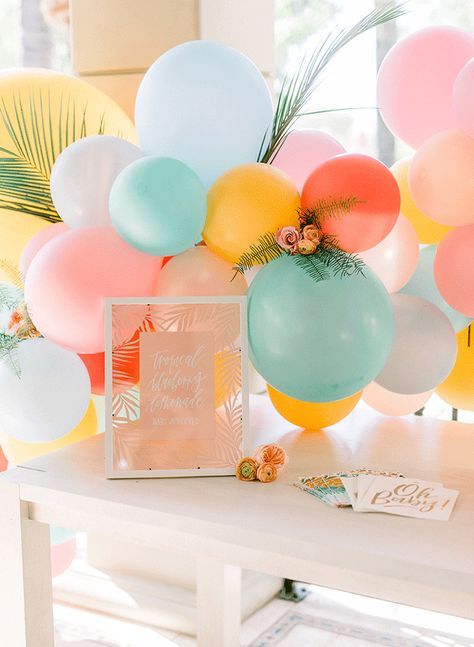 A Colorful Tropical Gender Reveal - Inspired By This Flower Themed Gender Reveal, Gender Reveal Tropical Theme, Gender Reveal Summer Theme, Summertime Gender Reveal Ideas, Tropical Gender Reveal Party, Summer Theme Gender Reveal, Pool Party Gender Reveal Ideas, Fruit Gender Reveal, Gender Reveal Party Theme Summer