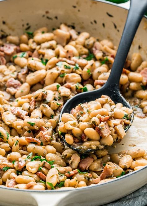 These White Beans with Bacon and Herbs are so simple to make, rich and savory, comforting, loaded with flavor and super delicious. www.jocooks.com #beansandbacon White Beans And Bacon, Beans And Bacon, Cannellini Beans Recipes, Beans With Bacon, White Bean Recipes, Jo Cooks, Veggie Side Dishes, Bacon Recipes, Mediterranean Diet Recipes