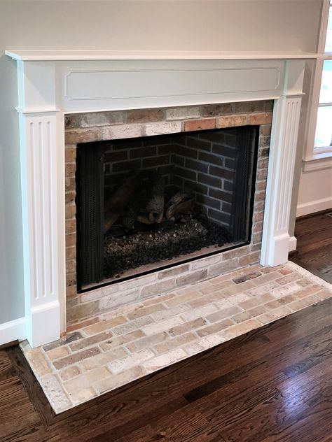 Fireplace Flat Hearth, Flat Fireplace Hearth Ideas, Framed Brick Fireplace, Low Profile Fireplace Hearth, Fireplace Brick Patterns, Floor Level Fireplace, Brick Fireplace Surround Ideas, Fireplace No Surround, Wood And Tile Fireplace Surround