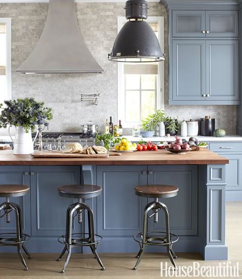 beautiful masculine kitchen by Parrish Chilcoat & Joe Lucas featured in House Beautiful.  Love the two tones of gray from Farrow & Ball's Down Pipe, to Benjamin Moore's Chelsea gray on the island.  The vintage stools, industrial pendant fixture, and the acid washed seagrass limestone backsplash are simply gorgeous! Blue Gray Kitchen Cabinets, Grey Blue Kitchen, Серая Кухня, Blue Kitchen Cabinets, Kabinet Dapur, Herringbone Backsplash, Blue Cabinets, Classic Kitchen, Grey Kitchen Cabinets