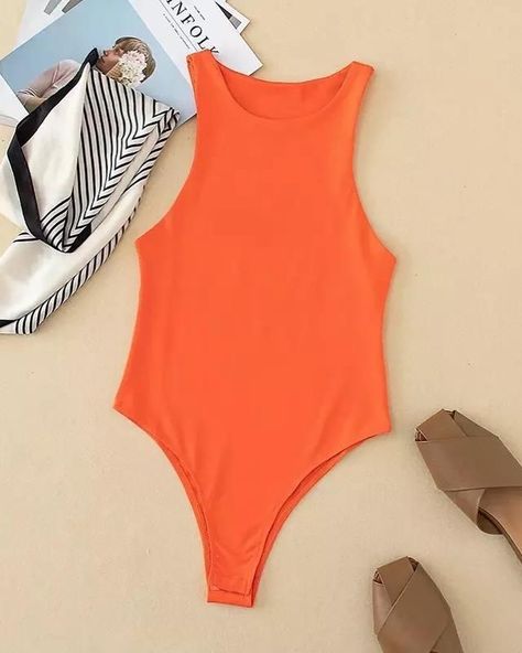 Double layered solid round neck sleeveless bodysuit. Sizes: S,M,L Price: 1,700 Colors: Orange Colors Orange, Sleeveless Bodysuit, Round Neck, Wardrobe, Orange, On Instagram, Quick Saves, Instagram, Color