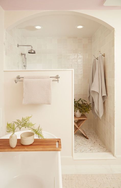 warm white bathroom, arched shower detail Calm And Serene Bathroom, White And Cream Bathroom Master Bath, Neutral Cream Bathroom, Blush And White Bathroom, Light And Airy Half Bathroom, Organic Shower Design, Cozy Shower Ideas, Warm Master Bath Ideas, Arch Shower Entry