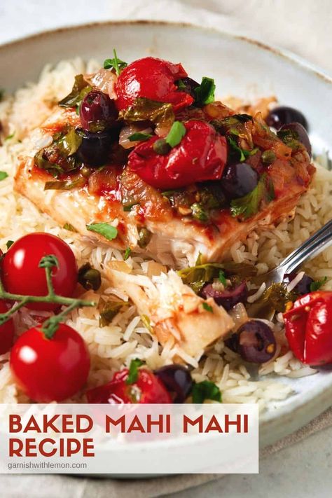 This simple, healthy Baked Mahi Mahi Recipe is loaded with Mediterranean flavor. Tomatoes, olives and capers create a rustic sauce for this mild-flavored fish, making it perfect to serve over pasta or rice. Take this easy dinner from oven to table in less than 40 minutes! Mahi Mahi Recipes Baked, Mahi Recipes, Baked Mahi Mahi, Mahi Mahi Recipe, Recipe With Tomatoes, Mahi Mahi Recipes, Easy Mediterranean Diet Recipes, Healthy Baked, Fish Dinner