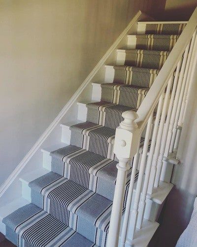 Forgot to take the before pictures of the carpeted stairs!#houserenovation #annieselke#dashandalbert Navy And White Rug, Carpeted Stairs, Stair Makeover, Dash And Albert Rugs, Dash And Albert, Stair Runners, Cream Area Rug, Cotton Area Rug, Coastal Design