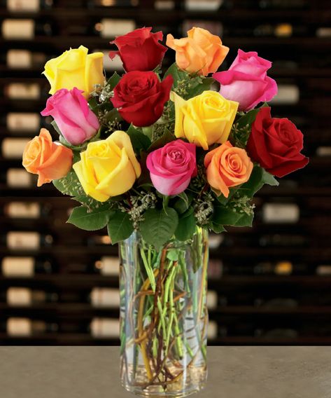 One dozen of the finest Ecuadorian roses carefully hand selected and arranged in a glass. A natural beauty! #griffinsfloraldesign Dozen Roses Arrangement, Champagne Moet, Ecuadorian Roses, 12 Roses, Get Well Flowers, Rose Belle, Casket Sprays, Dozen Roses, Clear Vase