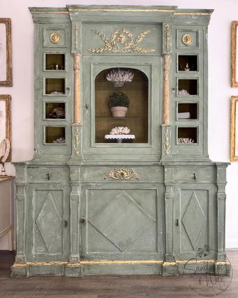 She is complete! Leonie, French empire revival china cabinet. Beautifully refinished to match the empire period. While I do enjoy a lacquer piece and perfect mirror like finish…It felt wonderful to use the classic traditional mediums again. I will never tire of a classic old world finish…it tells you a story and invites you closer to touch and feel. That speaks to my heart. ❤️ Now to rest my back, she will be available shortly…details to come. Till then my sweet friends, Bon apres-midi... China Cabinet Painted, Style China Cabinet, Vintage China Cabinets, Breakfront China Cabinet, Painted China Cabinets, Mid Century French, China Cabinets, French Empire, Glass Front Door