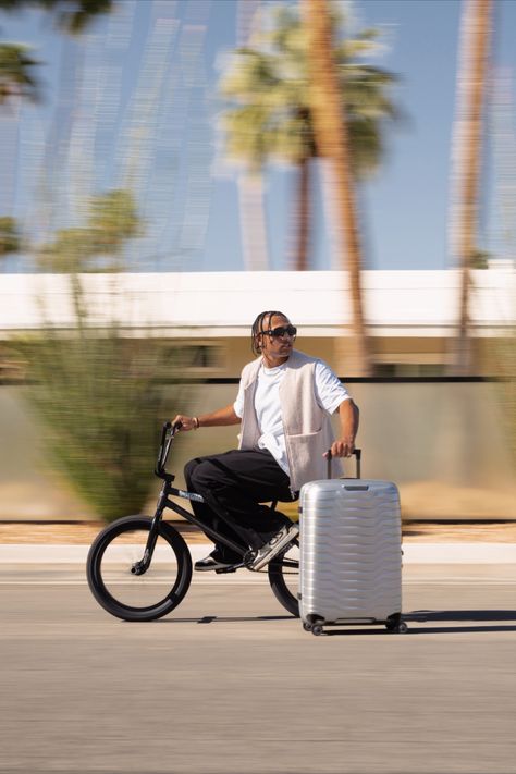 man on bike going fast with silver samsonite luggage Samsonite Luggage, Travel Vibes, New Gods, Photography Poses Women, Luggage Sets, Ad Campaign, Travel Gear, Winchester, Old Money