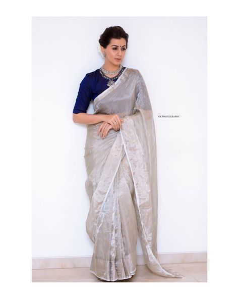 Image may contain: 1 person, standing Kora Silk Sarees, Indian Sari Dress, Grey Saree, Sari Dress, Tissue Saree, Indian Saree Blouse, Indian Saree Blouses Designs, Saree Blouse Patterns, Linen Saree