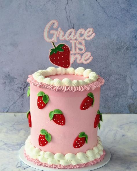 "🍓 Sweet as a strawberry! 🍓 Celebrating Grace's first year with this adorable pink and red berry-themed cake. Perfect for a berry special milestone! 💕🎂 #StrawberryCake #GraceIsOne #FirstBirthdayCelebration #CustomCakes" Berry First Cake, Strawberry Shaped Cake, Berry 1st Birthday Cake, Strawberry Smash Cake, Strawberry Cake, Pink And Red, Custom Cakes, Themed Cakes, Cake Smash