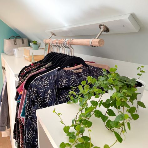 Attic Clothes Hanging, Slanted Ceiling Loft Ideas, Loft Storage Ideas Organizing Slanted Ceiling, Sloped Walk In Closet, Crawl Space Closet Ideas, Closet Attic Sloped Ceiling, Storage Under Eaves Sloped Ceiling, Bedrooms With No Closet Ideas, Diy Closet Slanted Ceiling